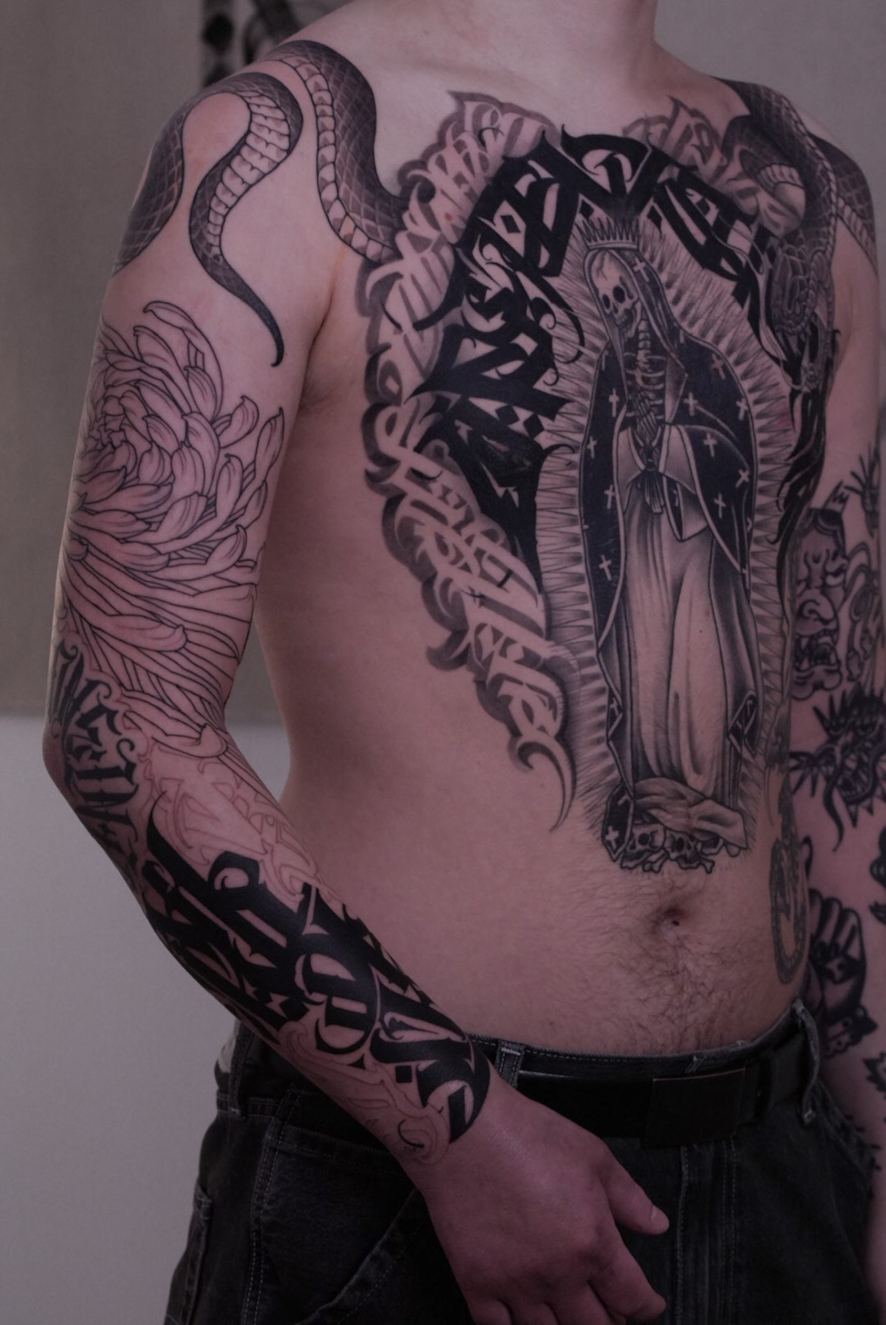 Chest piece with Santa Muerte and lettering